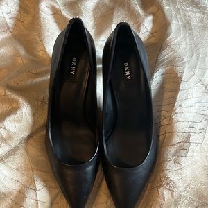 Brand new, never worn DKNY black pointy pumps.